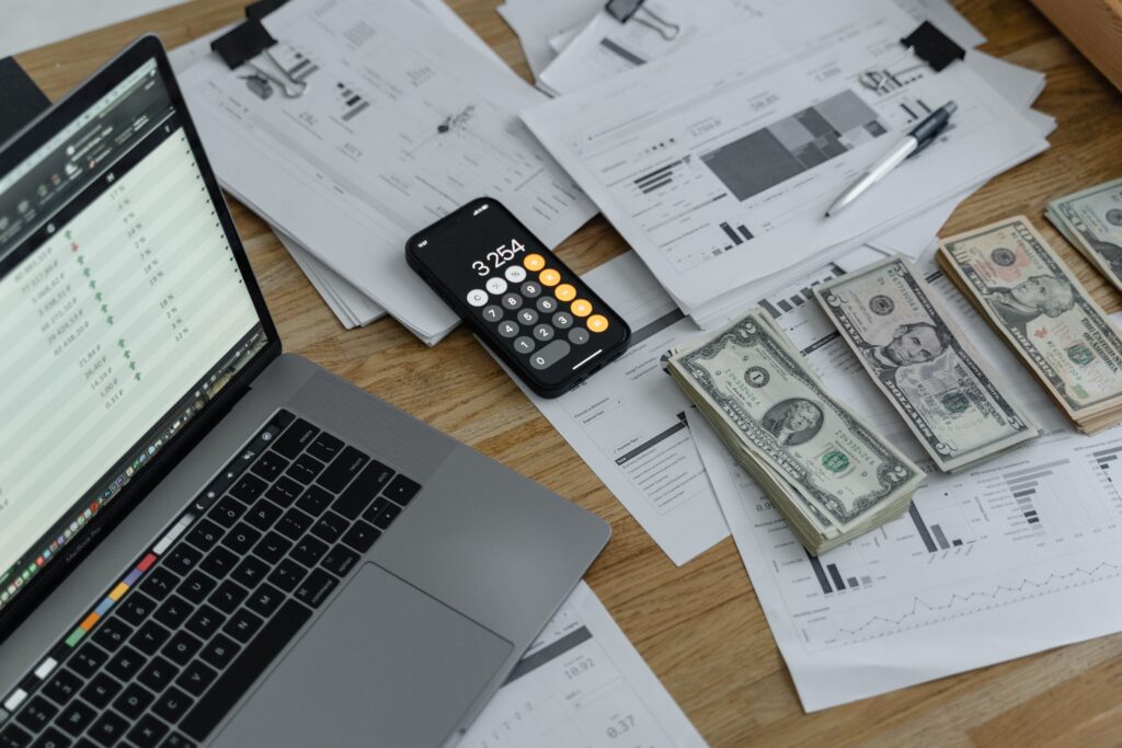 desk with money and calculator